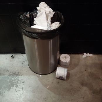 The Oak Room - Grill, Gaming and Cocktails - Supply of TP on floor next to trash can in women's restroom. - Bars Near Me - Henderson, Nevada