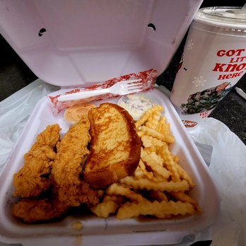 Raising Cane's Chicken Fingers - The box meal with 4 pieces chicken tenders, fries, slaw, bread and lemonade - Fast Food Near Me - Chino, California Raising Cane's Chicken Fingers - The box meal with 4 pieces chicken tenders, fries, slaw, bread and lemonade - Fast Food Near Me - Chino, California