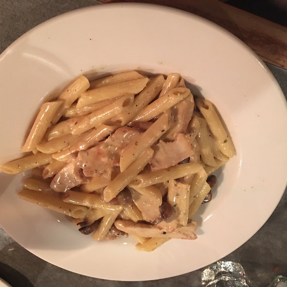 Grillers - a plate of pasta with meat and sauce - American Near Me - Rocky Mountain House, Alberta