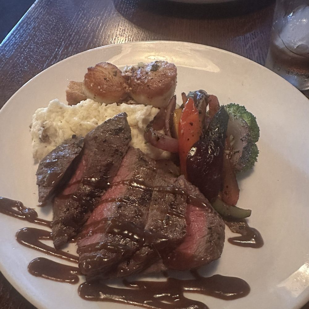 Ports Cafe - Flank steak with scallops - New American Near Me - Geneva, New York Ports Cafe - Flank steak with scallops - New American Near Me - Geneva, New York
