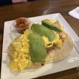 Migas (tortilla, egg, beans, avocado, onions, peppers, salsa)