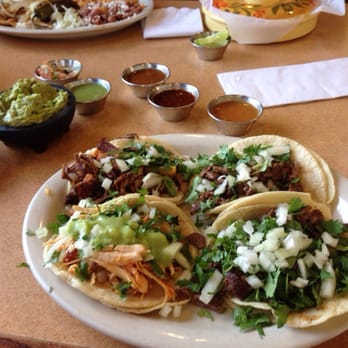 Antojitos Mexicanos - 1 shredded chicken taco, 1 shredded beef taco, 2 asada tacos (on right). - Mexican Near Me - Yakima, Washington Antojitos Mexicanos - 1 shredded chicken taco, 1 shredded beef taco, 2 asada tacos (on right). - Mexican Near Me - Yakima, Washington