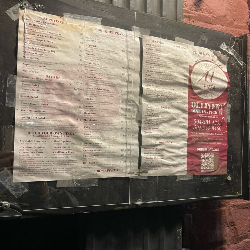 U Pizza - Menu on the wall on the left side of the entrance - Pizza Near Me - New Orleans, Louisiana U Pizza - Menu on the wall on the left side of the entrance - Pizza Near Me - New Orleans, Louisiana