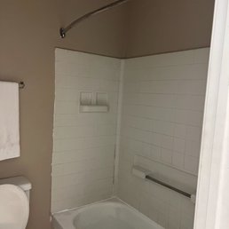 Mold, no shower curtain, cracks in bathtub. Mold, no shower curtain, cracks in bathtub.