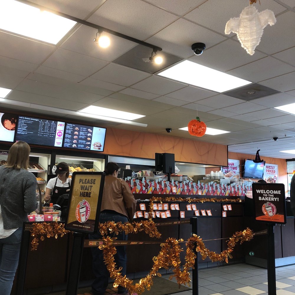 customers in a dunkin donuts shop