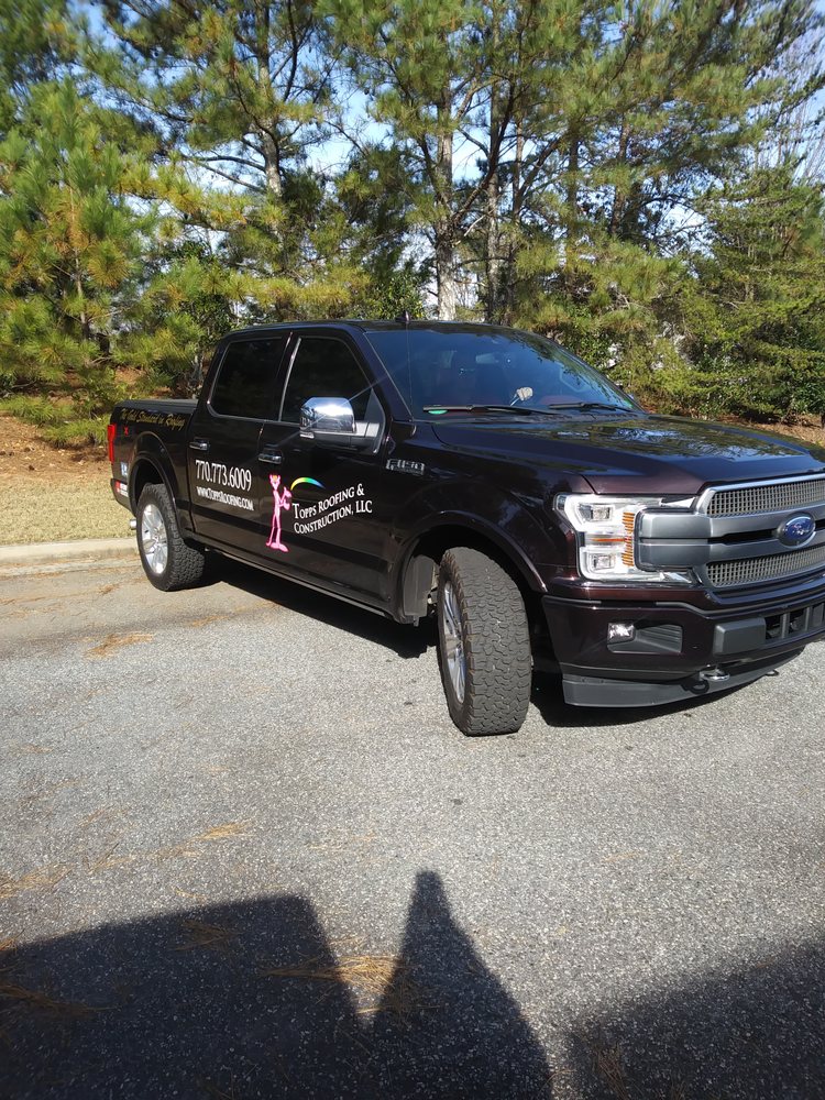 Slide of Topps Roofing & Construction