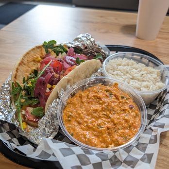 Pita Press - My made to order pita with Jasmine rice and an app sized portion of feta frenzy dip - Mediterranean Near Me - Greensboro, North Carolina Pita Press - My made to order pita with Jasmine rice and an app sized portion of feta frenzy dip - Mediterranean Near Me - Greensboro, North Carolina