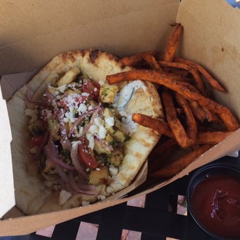 Cafe Metropole - Chicken pita with a side of sweet potato fries - yum. I mopped up every bite - Sandwiches Near Me - Avalon, California Cafe Metropole - Chicken pita with a side of sweet potato fries - yum. I mopped up every bite - Sandwiches Near Me - Avalon, California