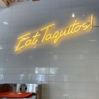 Roll Em Up Taquitos - A cool sign in the restaurant - Mexican Near Me - Rancho Cucamonga, California