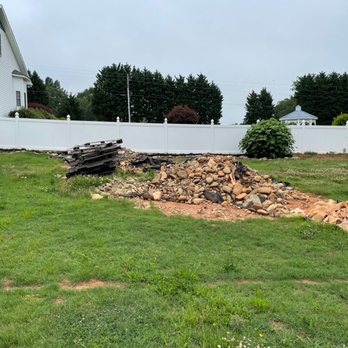 Earthscapes Easley - a pile of rubble in a yard - Decks & Railing Near Me Earthscapes Easley - a pile of rubble in a yard - Decks & Railing Near Me
