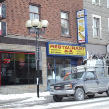 Restaurant AA - a truck parked in front of a restaurant - Hot Dogs Near Me - Montreal, Quebec