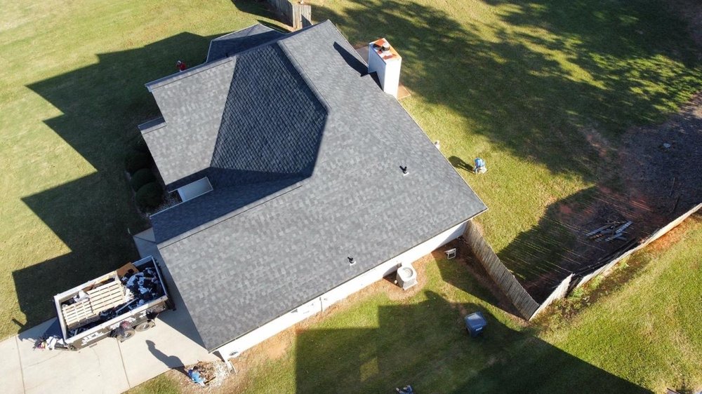 Slide of Complete Precision Roofing