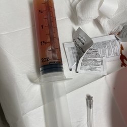 Cypress Orthopedics - Needle with fluid