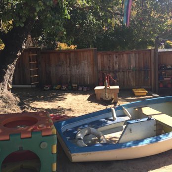 Children's Community Center - Front yard/hilltop boat and water pump. - Preschools Near Me - Berkeley, California