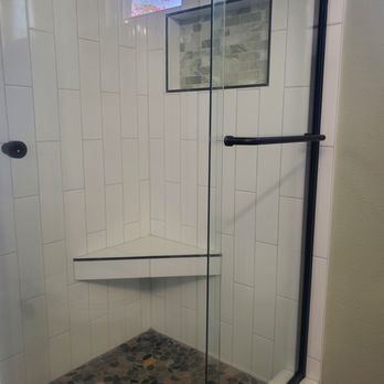 McCluskey Construction - Beautiful small shower with seating and niche. - General Contractors Near Me - Oceanside, California