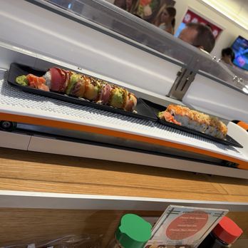 Happy Sushi SF - Rainbow roll on left - Sushi Bars Near Me - Spanish Fort, Alabama Happy Sushi SF - Rainbow roll on left - Sushi Bars Near Me - Spanish Fort, Alabama