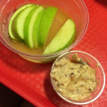 PDQ Chicken - Best item on the menu! Granny Smith apple with toffee dipping sauce for $2.39- a little pricey, but worth it. - Sandwiches Near Me - Oakland Park, Florida