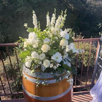 D'Lily's Flower - Wine barrel at the altar. - Florists Near Me - Watsonville, California D'Lily's Flower - Wine barrel at the altar. - Florists Near Me - Watsonville, California