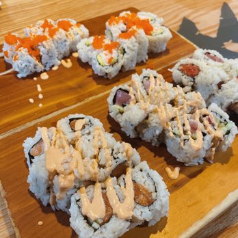 Isana - Top: Deluxe Cali Roll, Spicy Scallop Roll Bottom: Spicy Salmon Roll, Spicy Hamachi Roll, Spicy Tuna Roll - Sushi Bars Near Me - Kihei, Hawaii Isana - Top: Deluxe Cali Roll, Spicy Scallop Roll Bottom: Spicy Salmon Roll, Spicy Hamachi Roll, Spicy Tuna Roll - Sushi Bars Near Me - Kihei, Hawaii