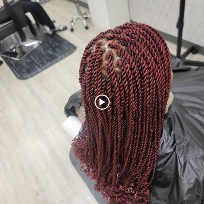 Exquisite African Hair Braiding - Explore our portfolio to witness the artistry and precision of our African hair braiding services. Each entry reflects our dedication to preserving cultural authenticity while incorporating modern trends. From intricate braided styles to protective hairstyles, we take pride in transforming hair into a work of art.