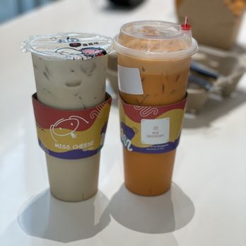 Miss Cheese Tea Cafe - Peach Oolong Cheezlicious Tea(left) and Thai tea(right) - Bubble Tea Near Me - Pasadena, California Miss Cheese Tea Cafe - Peach Oolong Cheezlicious Tea(left) and Thai tea(right) - Bubble Tea Near Me - Pasadena, California