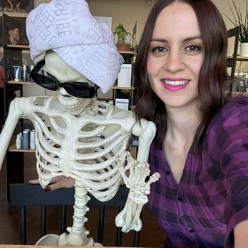Tribe Salon and Spa - Vibing with their skeleton! Hair is Chocolate Brown with Face-framing layers by Jules! - Hair Salons Near Me - Roseville, California