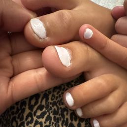 Nail polish wasn't even cleaned up, finger nail filed down extremely short. Nail polish wasn't even cleaned up, finger nail filed down extremely short.
