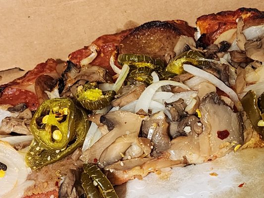 Photo of The Pizza House - Columbus, OH, US. a slice of pizza in a box