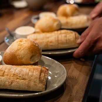 Roja Los Altos - Bread Service:
Baguette, House Roll, Browned Butter,
Maldon Sea Salt - Modern European Near Me - Los Altos, California Roja Los Altos - Bread Service:
Baguette, House Roll, Browned Butter,
Maldon Sea Salt - Modern European Near Me - Los Altos, California