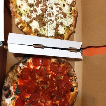 Coalfire Pizza - Pistachio Pesto Pizza (the whiter one) and Pepperoni & Whipped Ricotta Pizza (the redder one) - Pizza Near Me - Chicago, Illinois Coalfire Pizza - Pistachio Pesto Pizza (the whiter one) and Pepperoni & Whipped Ricotta Pizza (the redder one) - Pizza Near Me - Chicago, Illinois