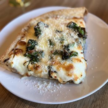 Sagra Italia - La Bianca focaccia slice - Italian Near Me - Rochester, New York Sagra Italia - La Bianca focaccia slice - Italian Near Me - Rochester, New York