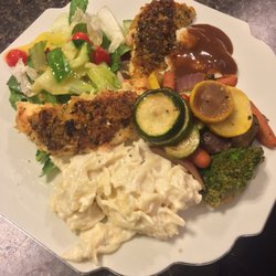 Pink Flamingo Catering - Delicious Parmesan Crusted Chicken with pasta alfredo, mixed veggies, salad, and other sides.
