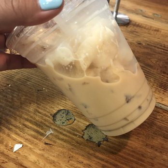 Macondo Coffee Roasters - Iced latte, a few sips in. - Coffee & Tea Near Me - Doral, Florida