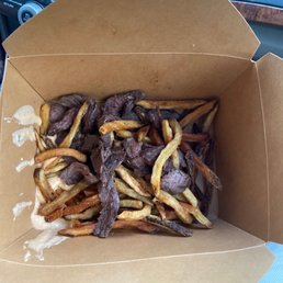 This is the stake frites! For $32 I would think it'd come lnicer rather than dumped into a to-go box!!!! The food IS good though! This is the stake frites! For $32 I would think it'd come lnicer rather than dumped into a to-go box!!!! The food IS good though!