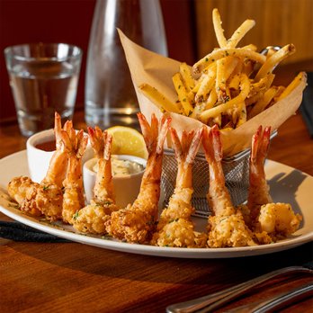Stoney River - a plate of fried shrimp and fries - Steakhouses Near Me - Chapel Hill, North Carolina Stoney River - a plate of fried shrimp and fries - Steakhouses Near Me - Chapel Hill, North Carolina