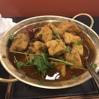 Dong Ting Spring - Specialty stinky tofu. $11.75. Comes in a pot with a little flame below. - Chinese Near Me - Thousand Oaks, California