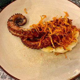 Pulpo a la Plancha (grilled octopus, truffle butter mashed potatoes, smoked pimiento)