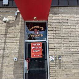 Exterior: rear entrance to Torchy's Tacos Exterior: rear entrance to Torchy's Tacos