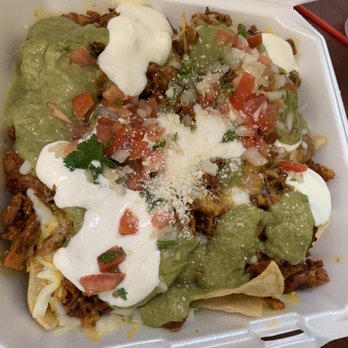 Tacos El Jefe's - Chicken Super Nachos Supreme-huge portion! Guac sour cream pico refried beans cheese. - Chicken Wings Near Me - Las Vegas, Nevada Tacos El Jefe's - Chicken Super Nachos Supreme-huge portion! Guac sour cream pico refried beans cheese. - Chicken Wings Near Me - Las Vegas, Nevada