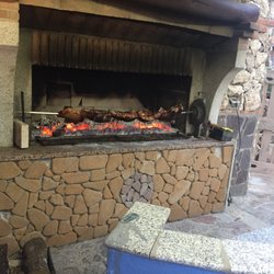 Hotel La Perla - Baby pigs on the spit
