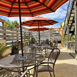 A peaceful, covered outdoor patio. Hidden oasis in Downtown Springfield.