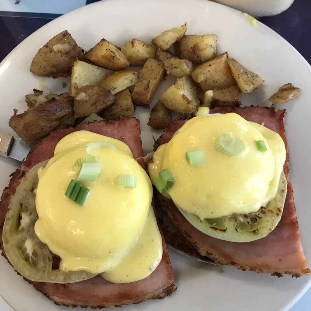 The Breakfast Cottage - Special: Eggs Benedict with lightly fried green tomatoes and rosemary ham. - Breakfast & Brunch Near Me - Nokomis, Florida The Breakfast Cottage - Special: Eggs Benedict with lightly fried green tomatoes and rosemary ham. - Breakfast & Brunch Near Me - Nokomis, Florida
