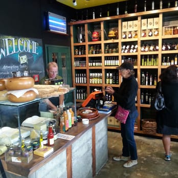 C'est Cheese - Paul tending to his customers - Cheese Shops Near Me - Featherston, WGN C'est Cheese - Paul tending to his customers - Cheese Shops Near Me - Featherston, WGN