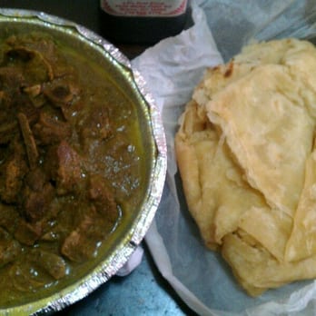Ali's Roti Shop - Curry Goat and Bust up Shut skin - Trinidadian Near Me - Bronx, New York Ali's Roti Shop - Curry Goat and Bust up Shut skin - Trinidadian Near Me - Bronx, New York