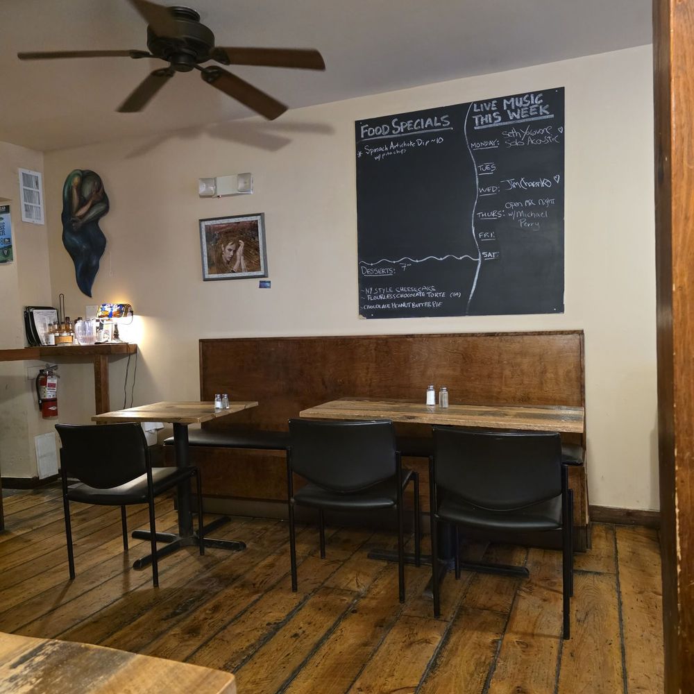 Moogs Place - Specials and live music schedule on chalk boards - New American Near Me - Morrisville, Vermont