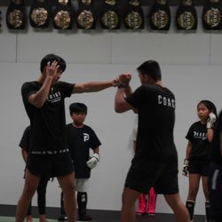 Prodigy Training Center - Coaches demonstrating in the 5pm MMA kids class.
Monday, Wednesday, Friday