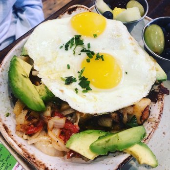 First Watch - Skillet Hash: Farmhouse- Eggs, avocado, house-roasted onions and tomatoes with Cheddar and Monterey Jack - Breakfast & Brunch Near Me - Orlando, Florida First Watch - Skillet Hash: Farmhouse- Eggs, avocado, house-roasted onions and tomatoes with Cheddar and Monterey Jack - Breakfast & Brunch Near Me - Orlando, Florida