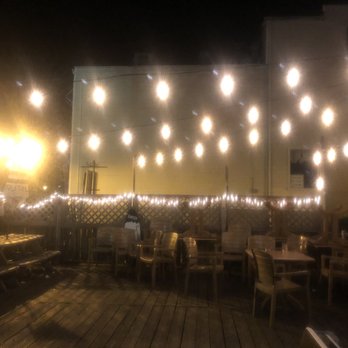 Portside Bar & Grill - outdoor seating and string lights - American Near Me - Port Jefferson, New York Portside Bar & Grill - outdoor seating and string lights - American Near Me - Port Jefferson, New York