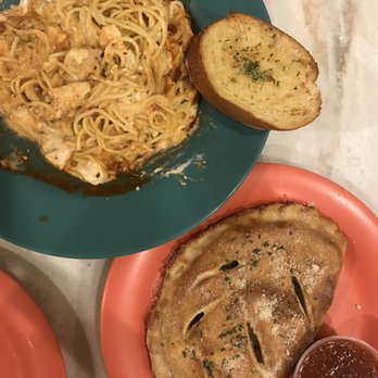 Amina Pizzeria - Vegetarian calzone and my bf's chicken alfredo mixed with marinara sauce - Pizza Near Me - Honolulu, Hawaii Amina Pizzeria - Vegetarian calzone and my bf's chicken alfredo mixed with marinara sauce - Pizza Near Me - Honolulu, Hawaii