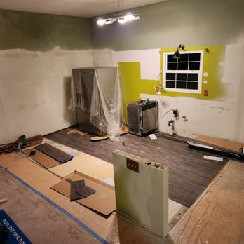 Beyond Builders - Progress photo (old cabinets removed, wall taken down, flooring installation) - General Contractors Near Me - Honolulu, Hawaii